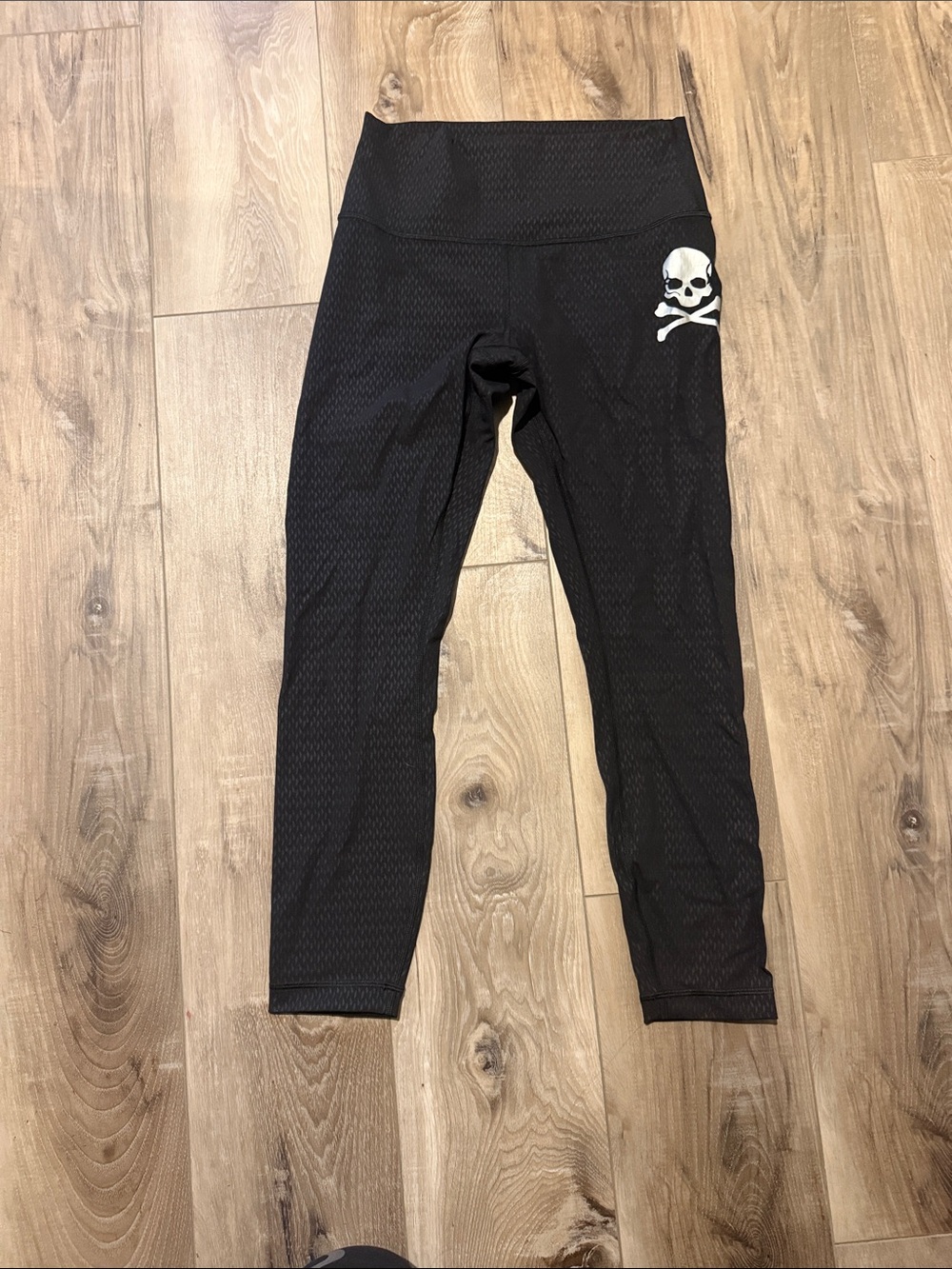 lululemon athletica Black Cropped Leggings with White Skull Accent